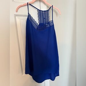 Royal blue medium spring and summer, sleeveless top, never worn.